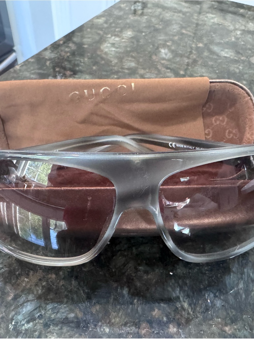 Gucci Clear Frame Sunglasses with Brown Gradient Lenses